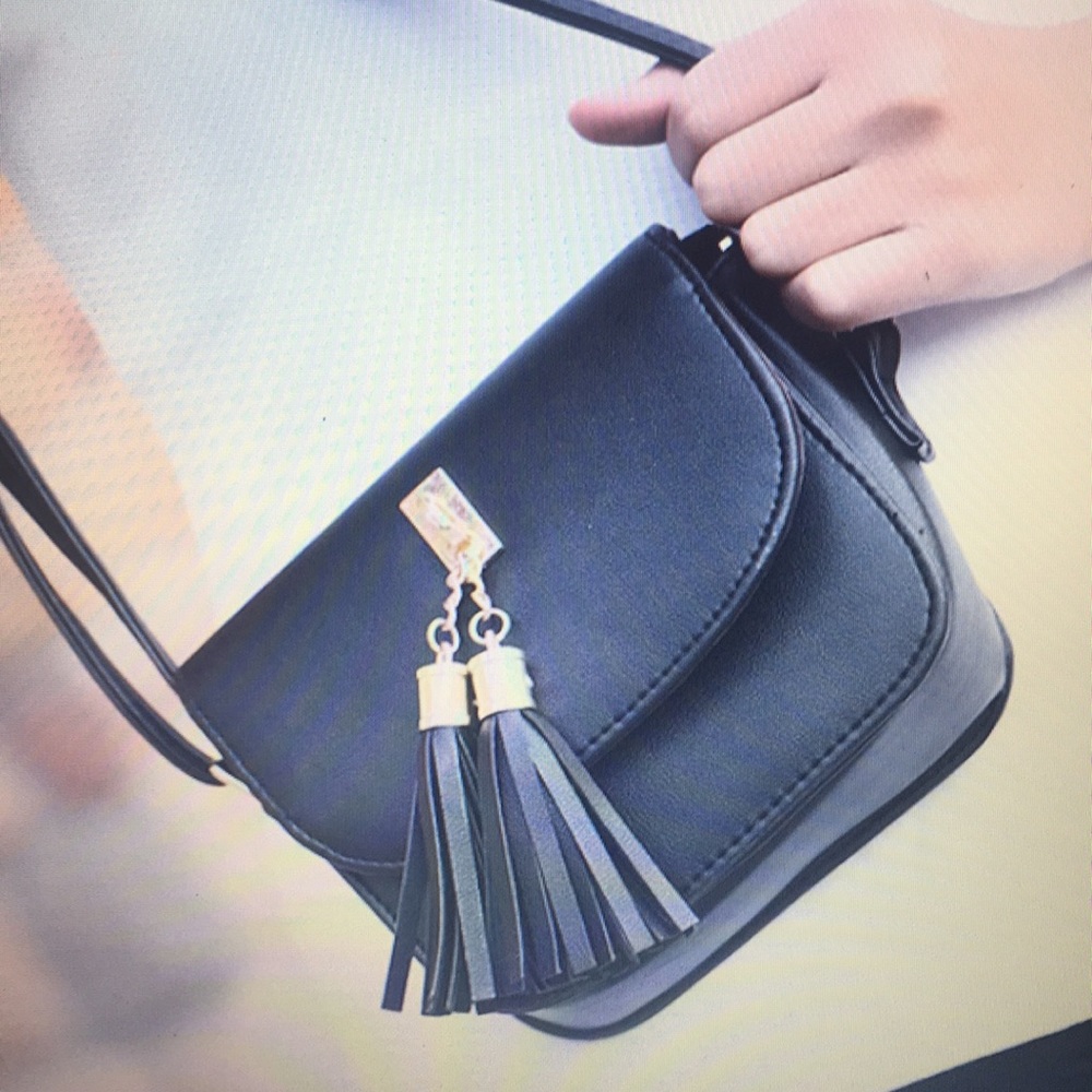 Mini black cross body bag with Tassel